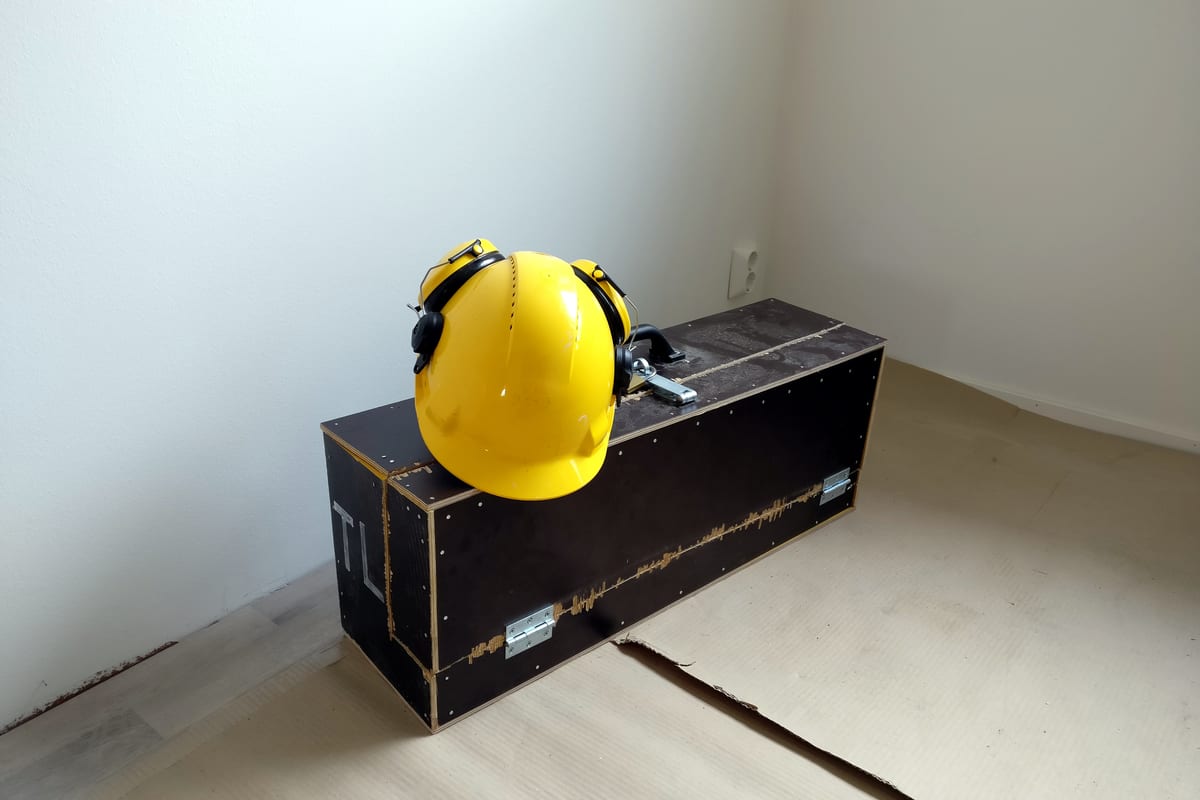 A closed toolbox with a carrying handle