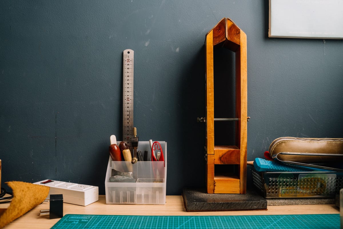 Tools and a ruler on an organised workbench